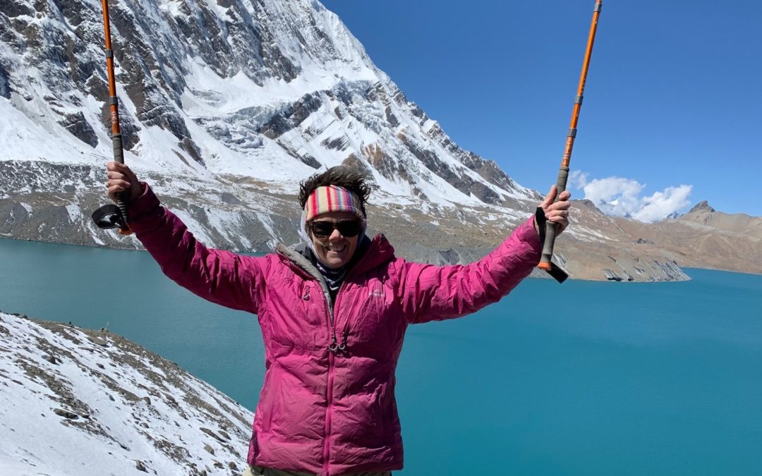 Jo Cordell-Cooper at Tilicho Lake in Nepal where I holiday without my family