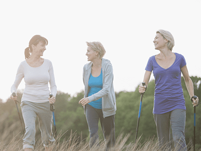3 women improving hiking fitness together